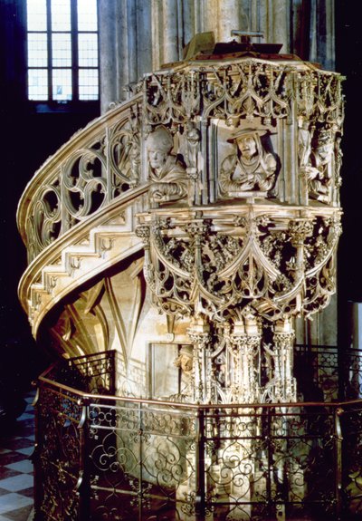 Pilgrams Pulpit, decorated with busts of the Four Fathers of the Church, theologians representing the four physiognomic temperaments, the sculptor himself looks out from a window below, by Anton Pilgr by Austrian School