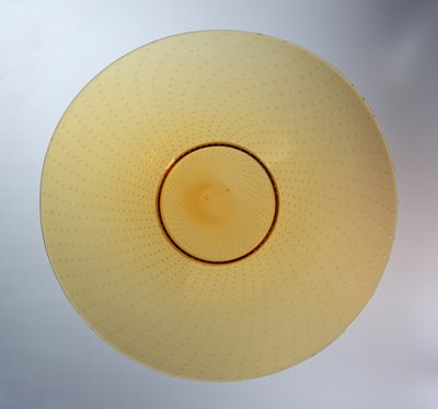 Dish in amber with enclosed bubble pattern, manufactured by James Powell & Sons, c.1938 by Barnaby Powell