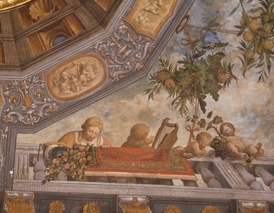 Checkers, musician, and cupids on balcony (detail), Treasury room, Ludovico il Moro Palace, Ferrara, Italy by Benvenuto Tisi da Garofalo