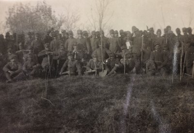 Album of the First World War in Friuli-Venezia Giulia: group portrait of the soldiers of the Infantry 112.mo with spades near the River Tower by Bourbon Del Monte