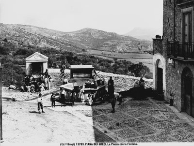 Piana dei Greci. The square with the fountain. by Brogi Brogi