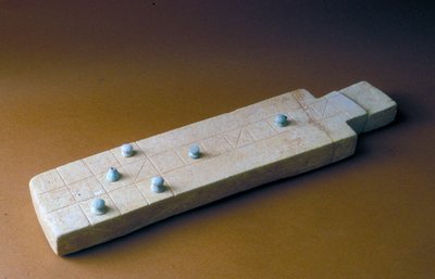 Game board with playing pieces, from Tell Beit Mirsim, Jordan, c.2000-1700 BC by Bronze Age