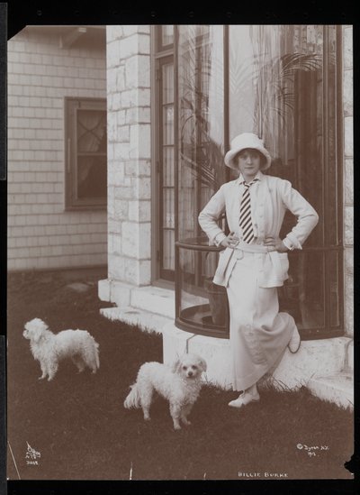 Billie Burke and two dogs at Burkeleigh Crest, her house in Hastingson, New York, 1912 by Byron Company