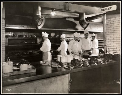 Cooks at the broiler in the kitchen of the Hotel Commodore, 1919 by Byron Company