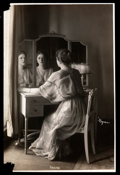 Portrait of Jobyna Howland Sitting at Her Dressing Table by Byron Company