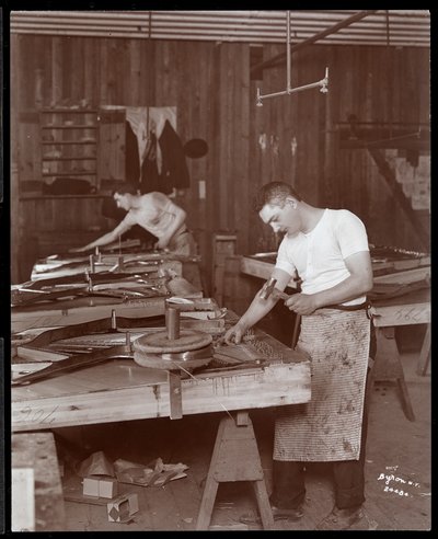 Two Men Working in the Harrington Piano Co. Factory, 1907 by Byron Company