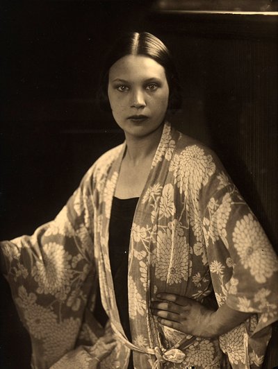Half-length portrait of Wanda Wulz wearing a kimono dressing gown by Carlo Wulz