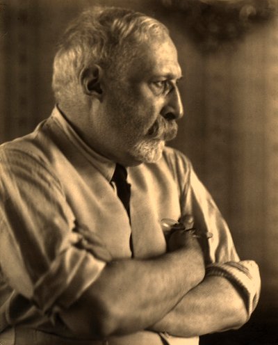 Profile portrait of the painter, Arturo Rietti with his arms folded by Carlo Wulz