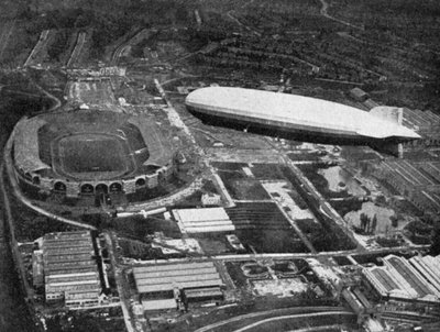 German airship Graf Zeppelin flying over Wembley during the FA Cup Final, London, 1930 by Central Press