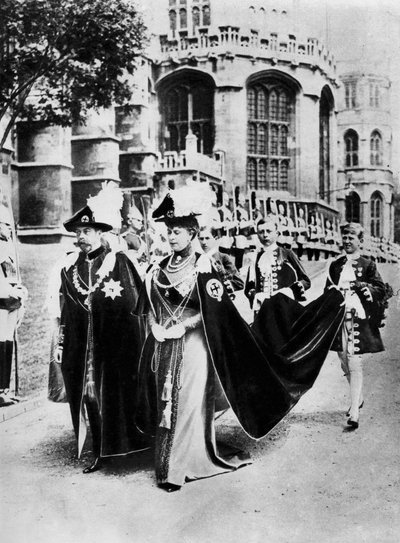 King George V and Queen Mary in the Robes of the Knights of the Garter, Windsor by Central Press