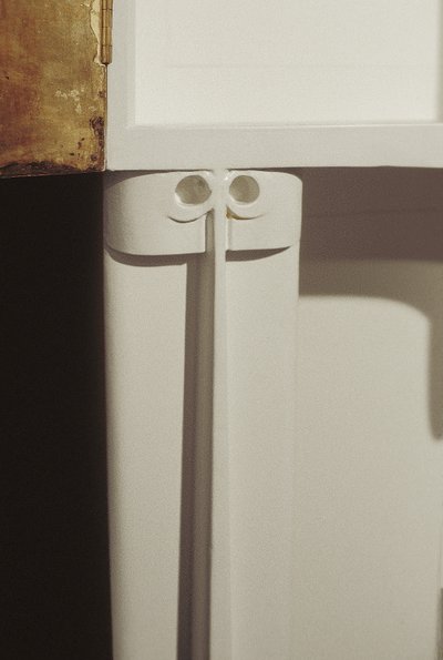 White cabinet designed for Mrs. Rowat, 1902 by Charles Rennie Mackintosh