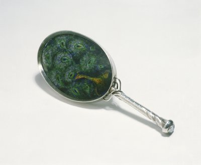 Hand mirror designed by Ashbee with peacock design enamelled by William Mark, made by the guild of Handicraft, 1903 by Charles Robert Ashbee
