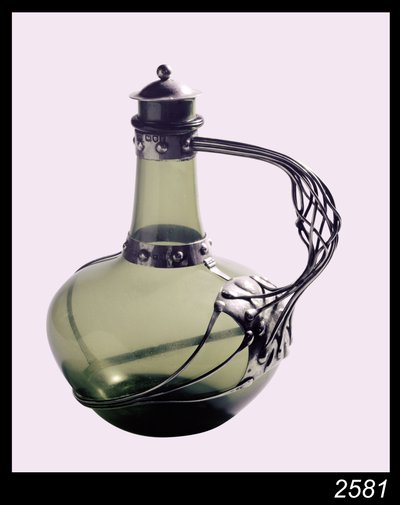 Silver-mounted green glass decanter with makers mark for the Guild of Handicraft, 1901 by Charles Robert Ashbee