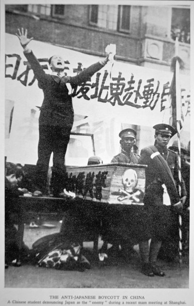A Chinese student denouncing Japan as the enemy at a mass meeting in Shanghai as part of the Chinese Anti-Japanese Boycott of 1932 by Chinese Photographer