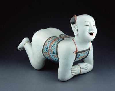 Chinese Porcelain Pillow in the Form of a Semi-Naked Boy by Chinese School