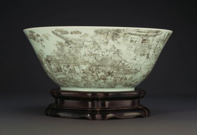 A large incised porcelain bowl depicting a continuous scene of ladies in the palace grounds by Chinese School