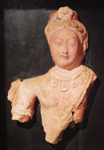 Head and bust of a Bodhisattva in princely costume, from Kumtura, Xinjiang by Chinese School