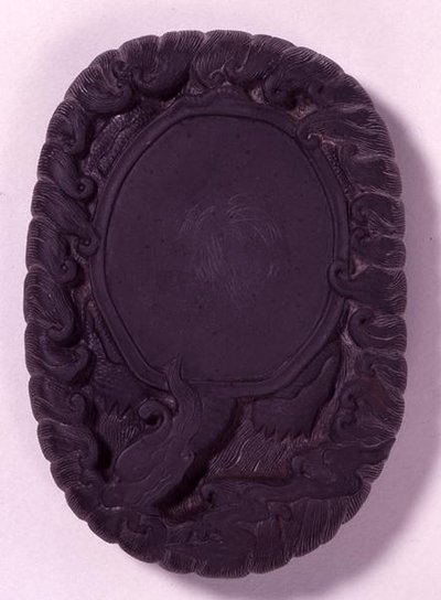 Inkstone carved as the large mythical Lo-shu tortoise among waves, probably Ming dynasty by Chinese School Chinese School
