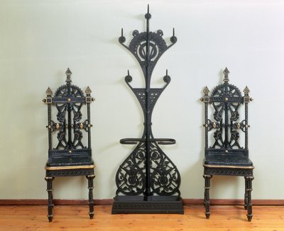 Coat, Hat and Umbrella Stand Flanked by Two Garden or Hall Chairs, Coalbrookdale by Christopher Dresser