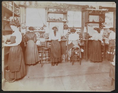 Empire Film Co. motion picture laboratory with men working and reels of film and cameras by Company Byron