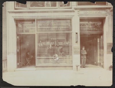 First floor facade of 122-124 E. 25th Street, the Camera Building, American Cinephone Company, American Kinograph Company and doorman, New York by Company Byron