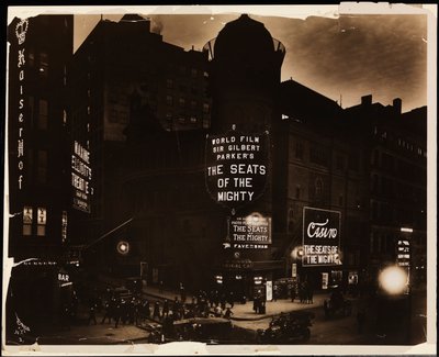 The Casino Theatre at night, crowds and cars, and construction workers digging in street, Broadway and 39th St., New York, c.1915 by Company Byron
