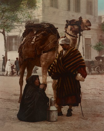 A Bedouin and his Wife in the Market by Company Photoglob