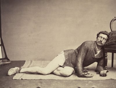 Man in Chainmail Tunic Posing as a Dying Soldier by Constant Delessert