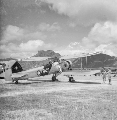 Fairey Swordfish I torpedo bomber reconnaissance biplane aircraft K8386, code 945, of 824 Squadron Fleet Air Arm, on Kai Tak airfield, Hong Kong by David Watkin Waters