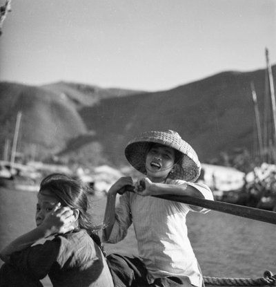 Two young sampan girls at Aberdeen, Hong Kong by David Watkin Waters