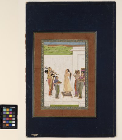 A woman completing her toilette, c.1725 by Deccani School