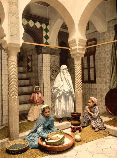 Moorish Women Preparing Couscous in a Courtyard, Algiers, Algeria, c.1899 by Detroit Photographic Co.