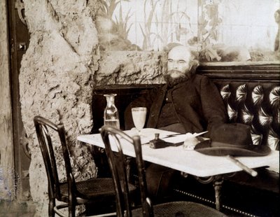 Verlaine in a Bistro Drinking Absinthe by Dornac