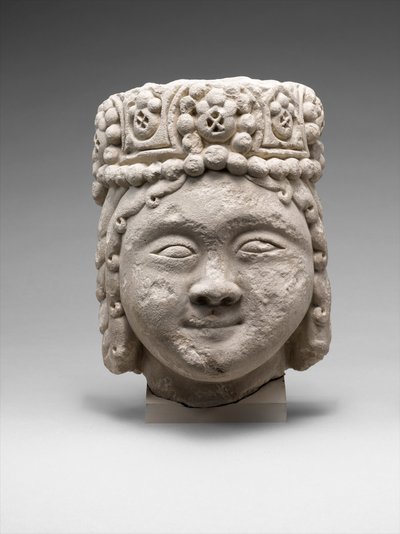 Head from a Figure with a Beaded Headdress by Dynasty Seljuq