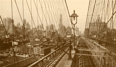 Lower Manhattan Viewed Through The Network Of Cables On Brooklyn Suspension Bridge, c1930 by ENA