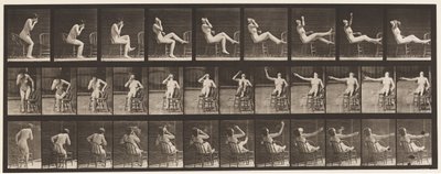 Sitting Down Placing Feet on Chair by Eadweard Muybridge