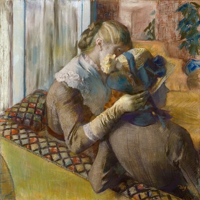 At the Fashionist. A Client Trying a Hat by Edgar Degas