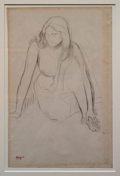 Woman Sitting at the Water