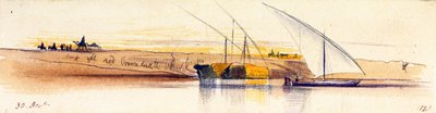 The banks of the Nile (Egypt), with three gyassis, two of whom are heavily loaded with straw, in the background, characters and animals are depicted in the setting sun by Edward Lear