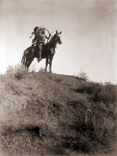 Absaroke Warrior on Horseback by Edward Sheriff Curtis