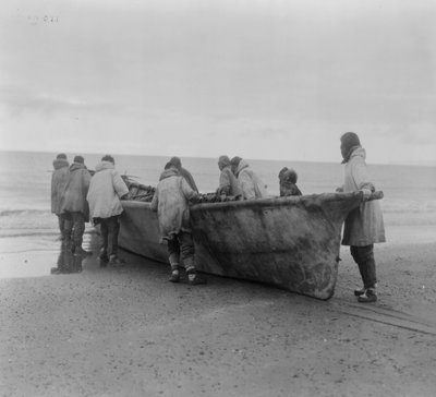 Native Americans launching a whale boat at Cape Prince of Wales, Alaska, c.1929 by Edward Sheriff Curtis