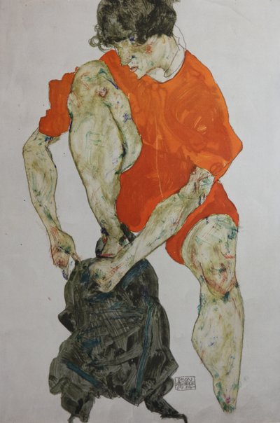 Female model in a red robe by Egon Schiele