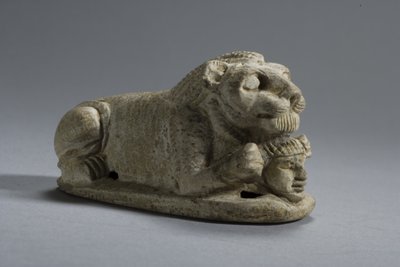 Lid of a recumbent Lion clutching a Head, Napata-Meroe, Upper Nubia by Egyptian