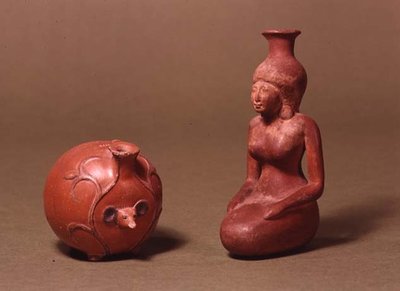 Vessels in the Shapes of a Girl and a Hedgehog by Egyptian