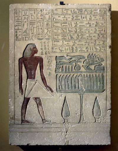 Painted limestone stele depicting Senusret at his offering table by Egyptian 12th Dynasty