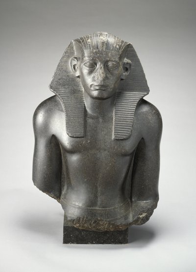Male head and torso of a sitting statue of King Sesostris III of Egypt by Egyptian 13th Dynasty