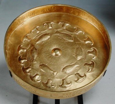 Dish belonging to General Thuty or Djehwty decorated with fish and flowers, New Kingdom, c.1479-1425 by Egyptian 18th Dynasty