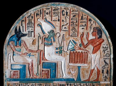 Egyptian antiquity: Nanai stele representing worshipping Osiris and Anubis, deity of the dead who holds the key of life in the shape of an Ankh. Painted limestone. End of the 18th dynasty. 14th century BC. Turin, Egyptian Museum by Egyptian 18th Dynasty