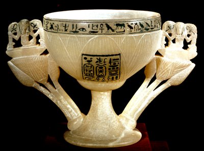 Egyptian antiquity: cup of the Immortality of the benefactors of Thebes. Lotus shaped alabaster chalice. From the treasure of Tutankhamun (1345-1327 BC) 18th dynasty. found in the Valley of kings, Thebes. 1342 BC. Cairo, Egyptian Museum by Egyptian 18th Dynasty