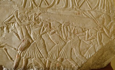 Egyptian antiquity: slaves carrying an obelisk during the great works of Pharaonic Egypt. (detail) by Egyptian 18th Dynasty